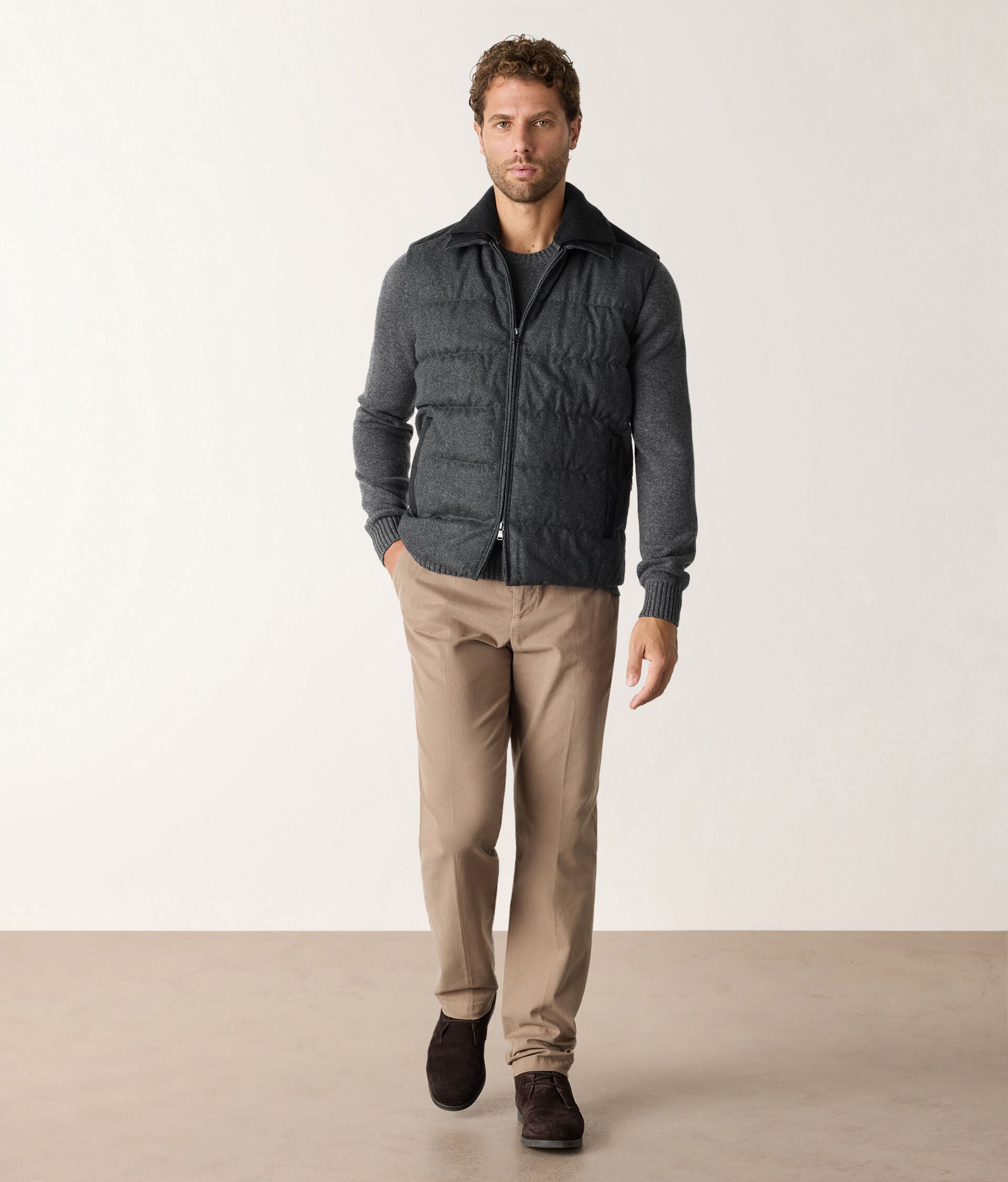 Sleeveless down jacket with leather details