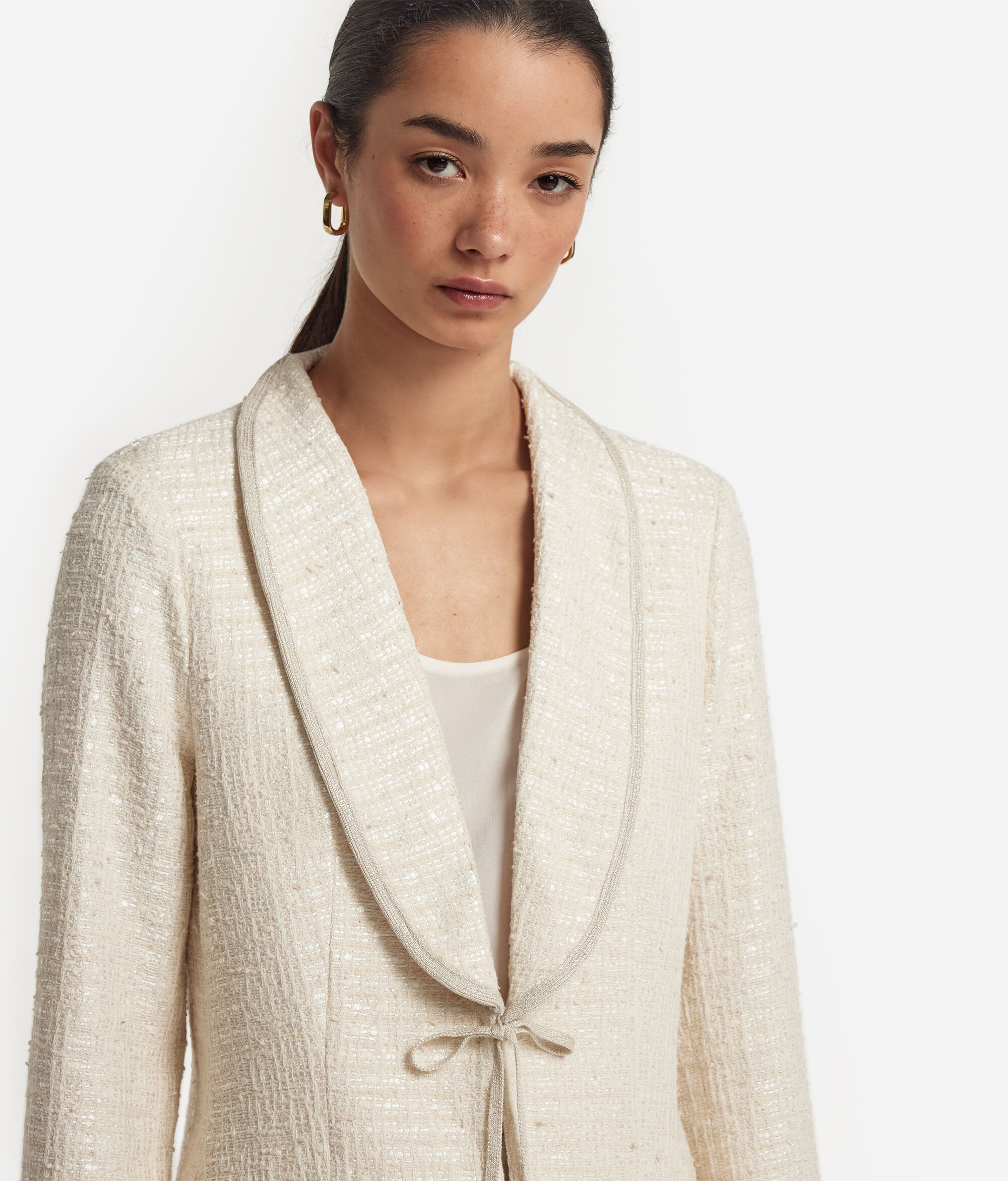 Veste en bouclette à paillettes