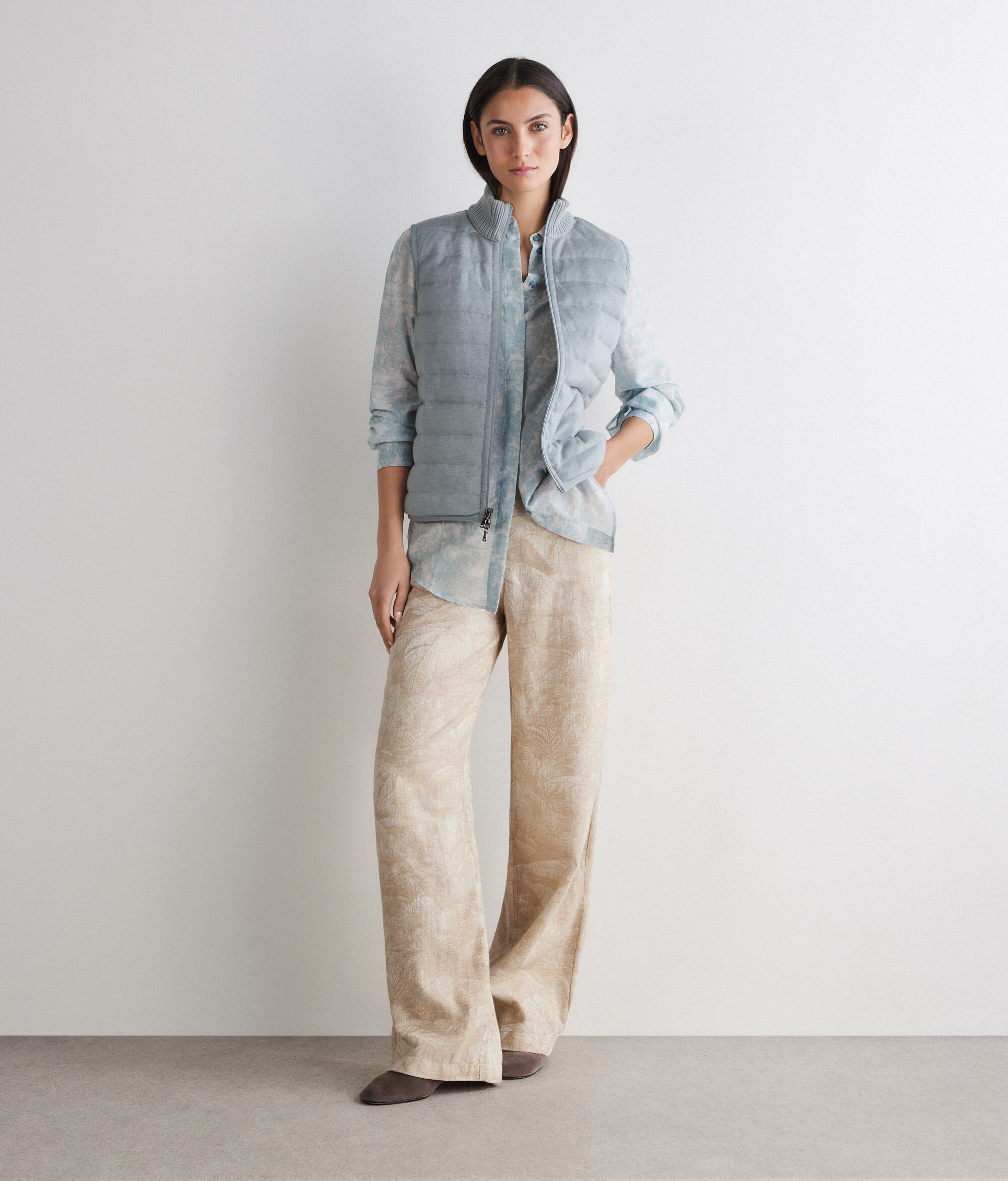 Piumino smanicato reversibile opaco