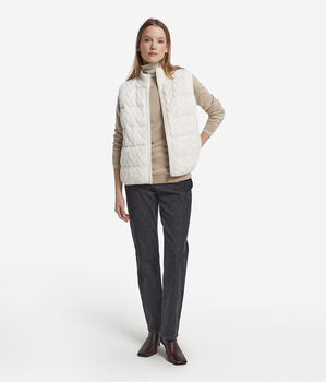 Plumífero sin mangas reversible con ochos