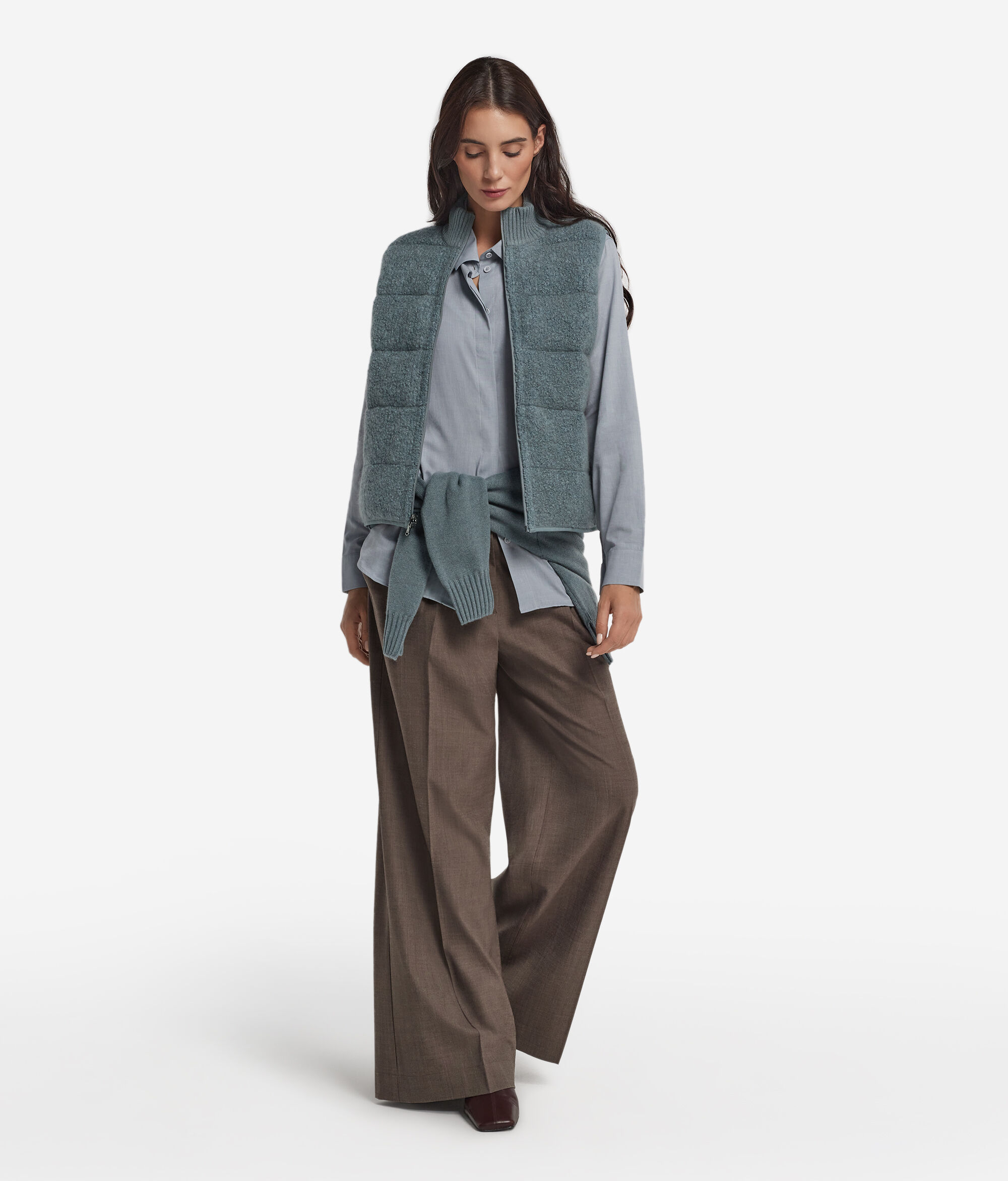 Piumino smanicato reversibile in bouclé e nylon