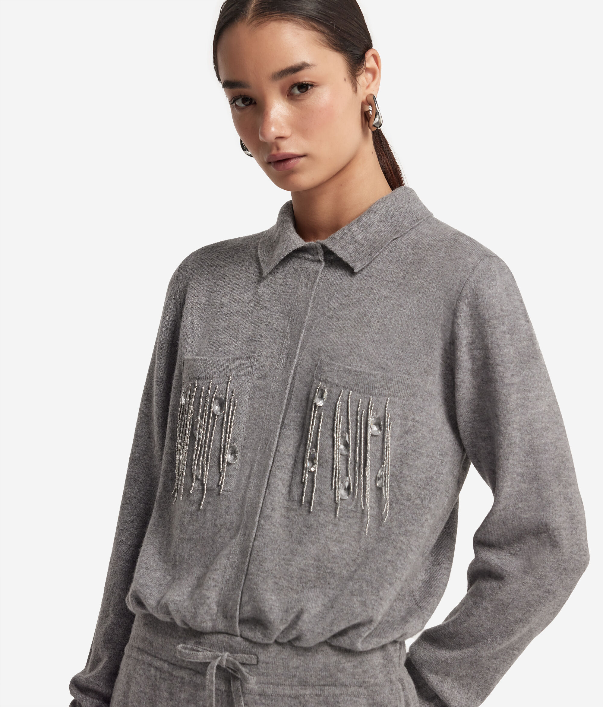 Mono de cashmere con flecos