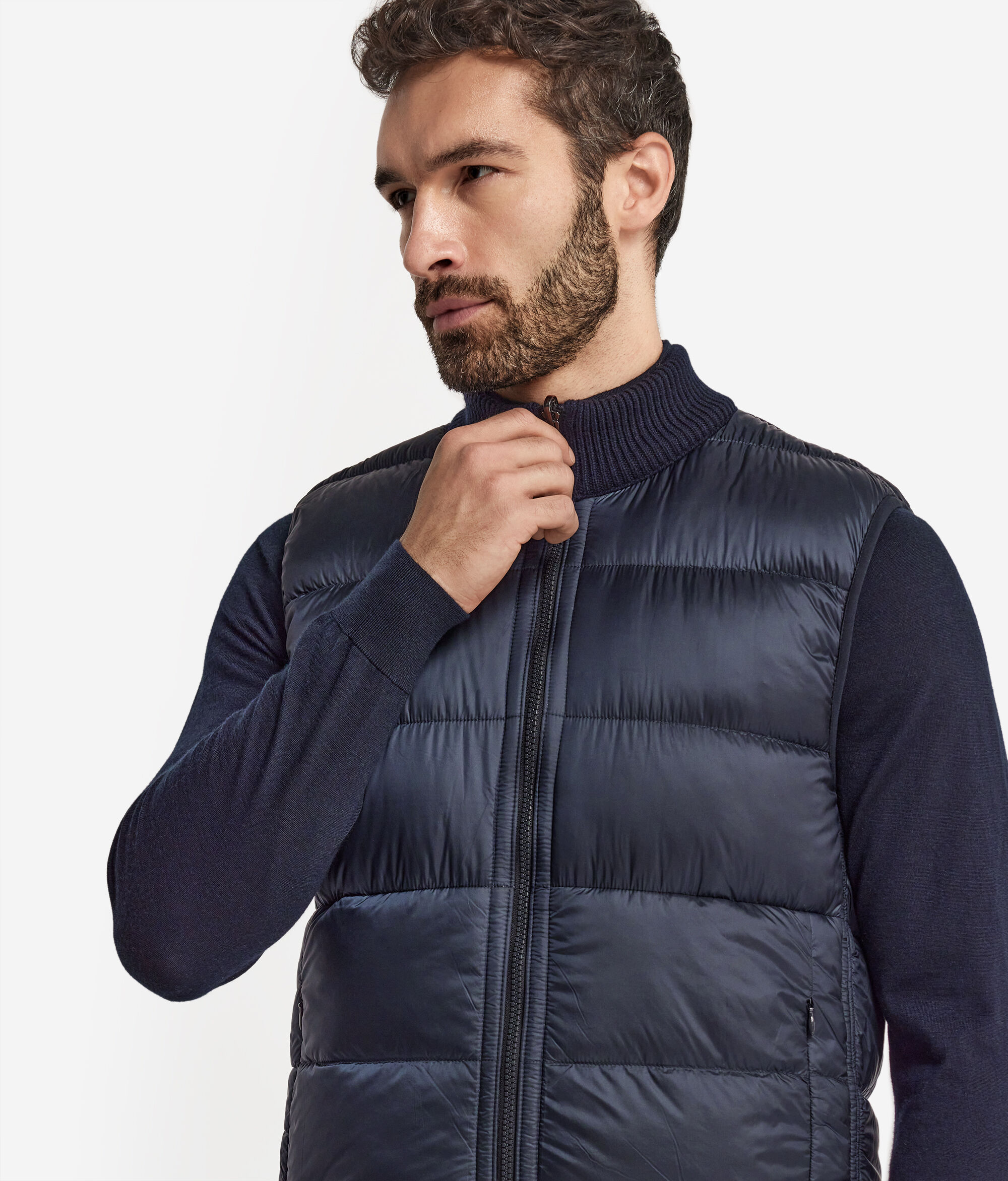 Двусторонний пуховый жилет