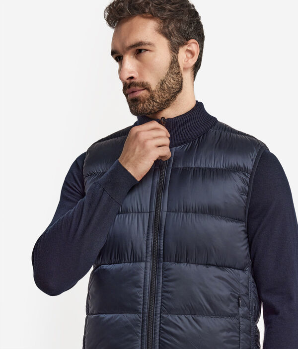 Двусторонний пуховый жилет