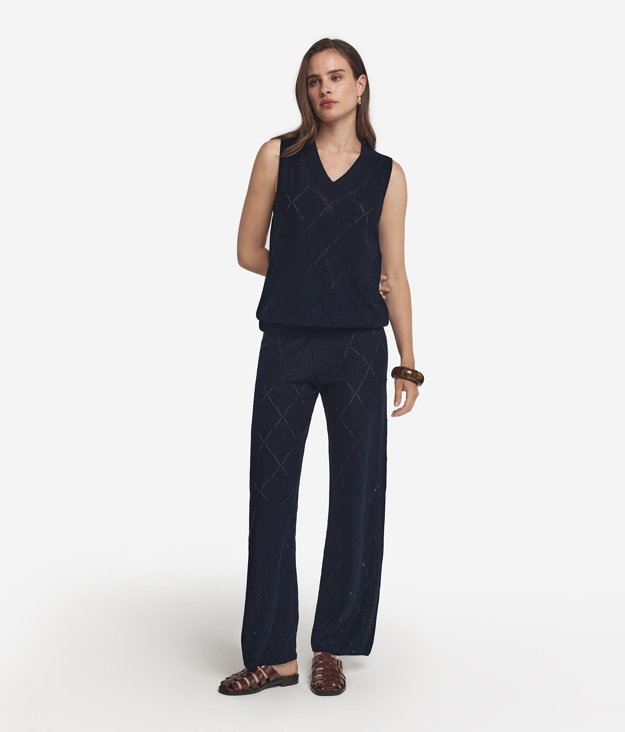 V-neck sleeveless top with diamonds