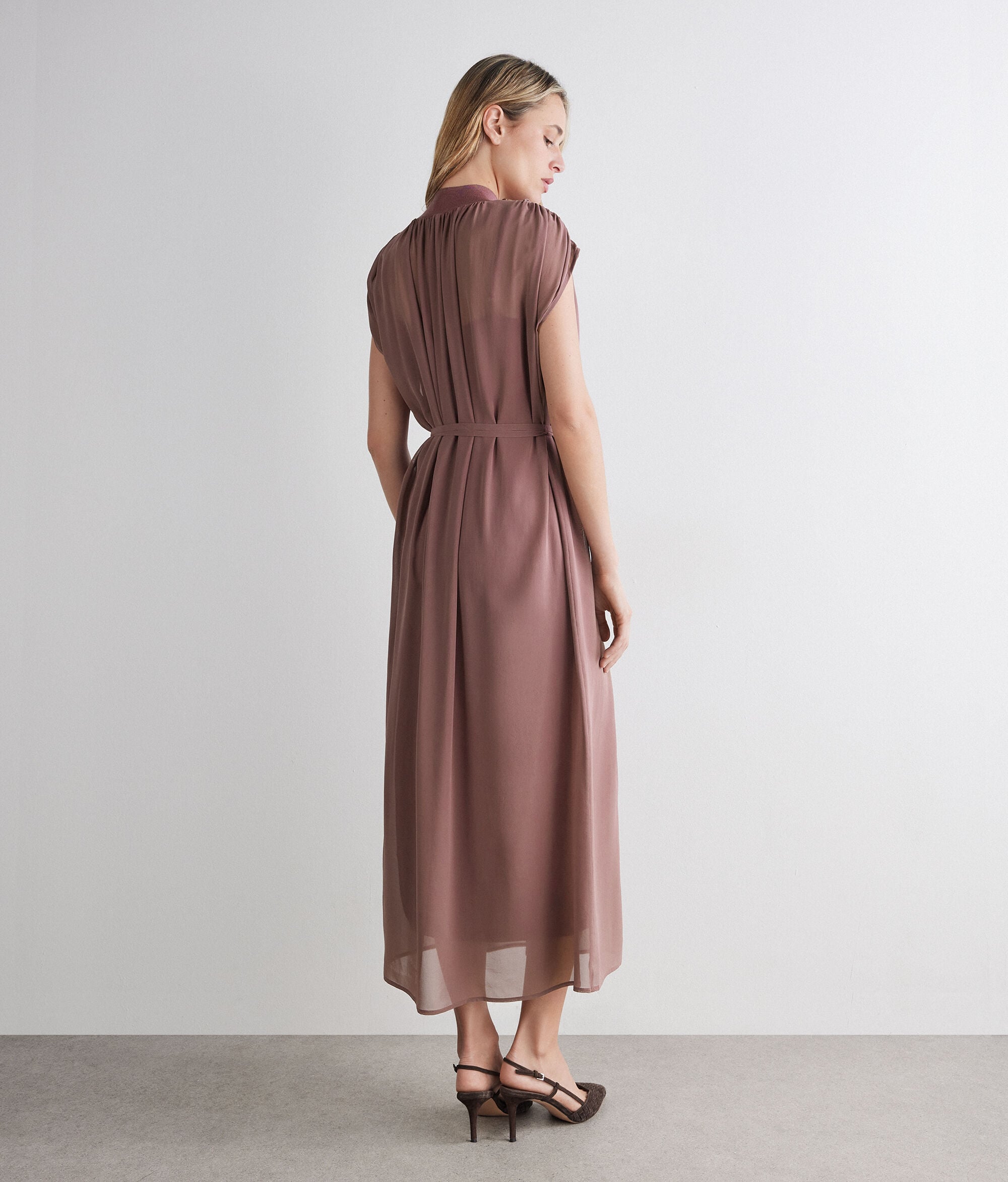 brown georgette dress "Where Chic Meets Chocolate", Own your elegance in our Brown Georgette Cape Gown a perfect blend of grace and power. With flowy cape sleeves and a flattering belted silhouette, this look radiates